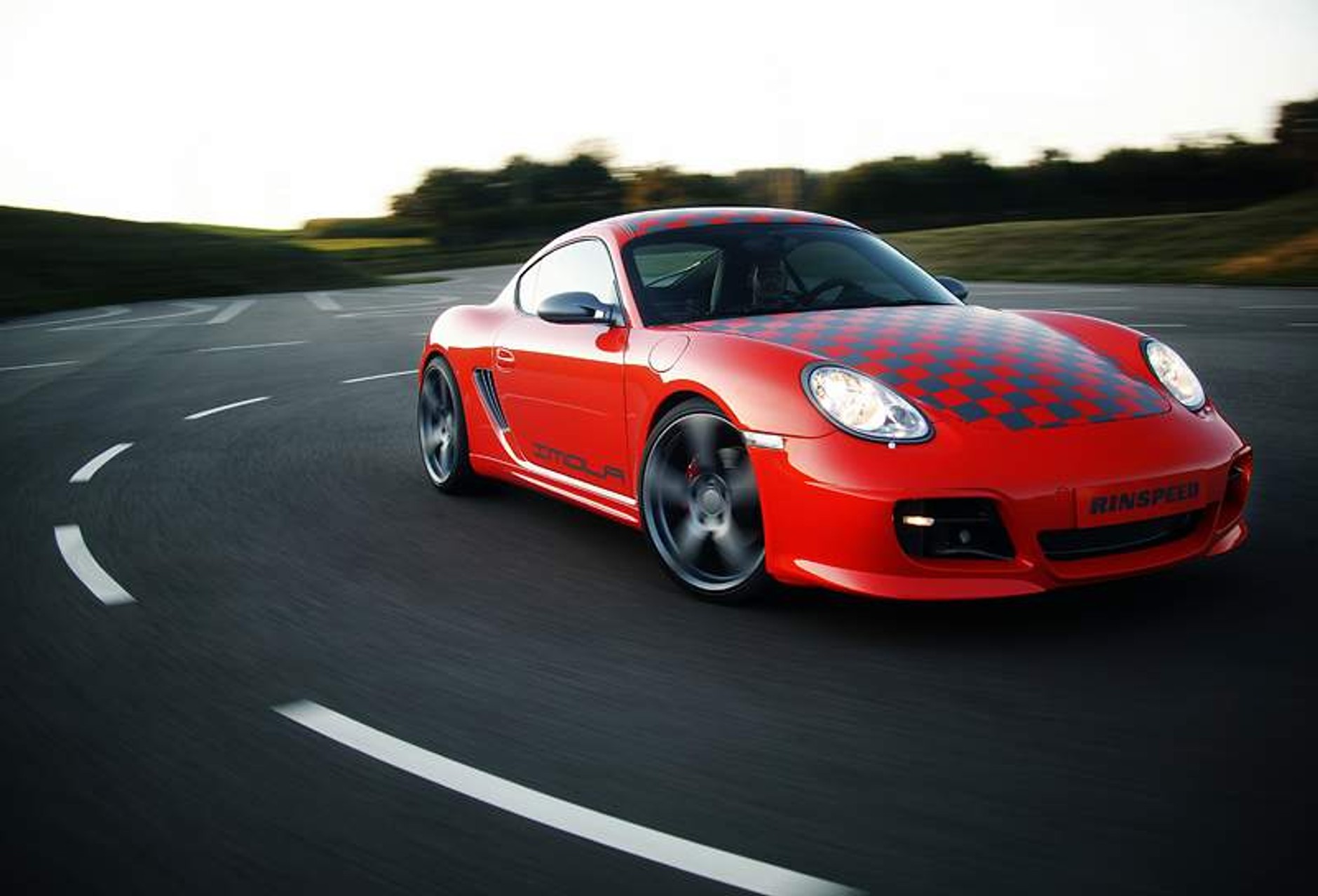 Rinspeed w Paryżu: podrasowany Cayman i Carrera 4