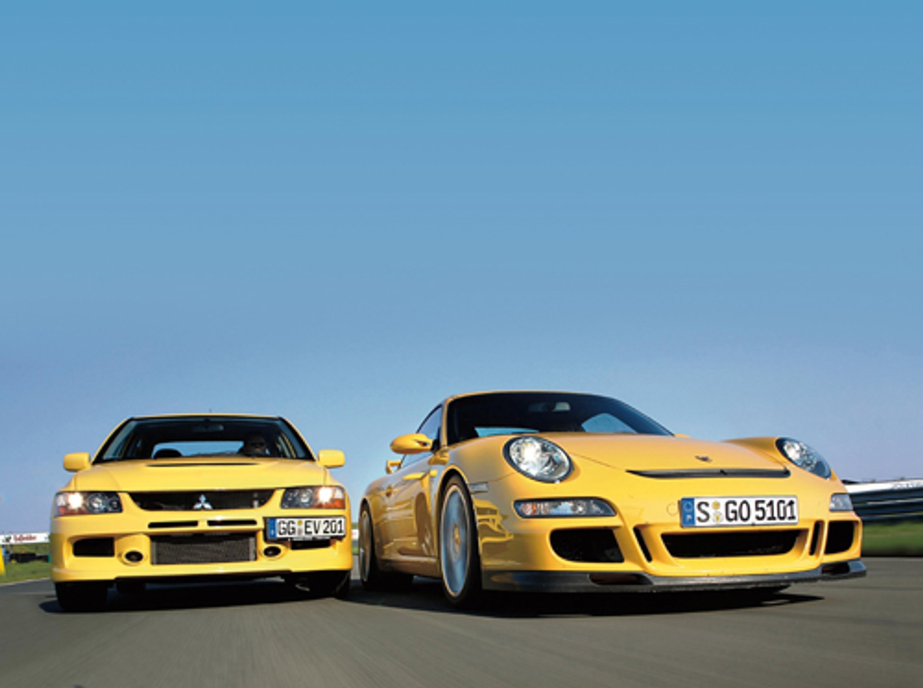 Lancer Evo IX kontra 911 GT3 - Ta sama frajda za 1/ 3 ceny?