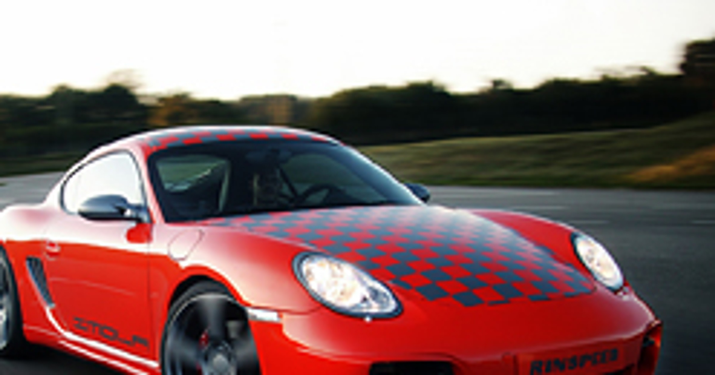 Rinspeed w Paryżu: podrasowany Cayman i Carrera 4
