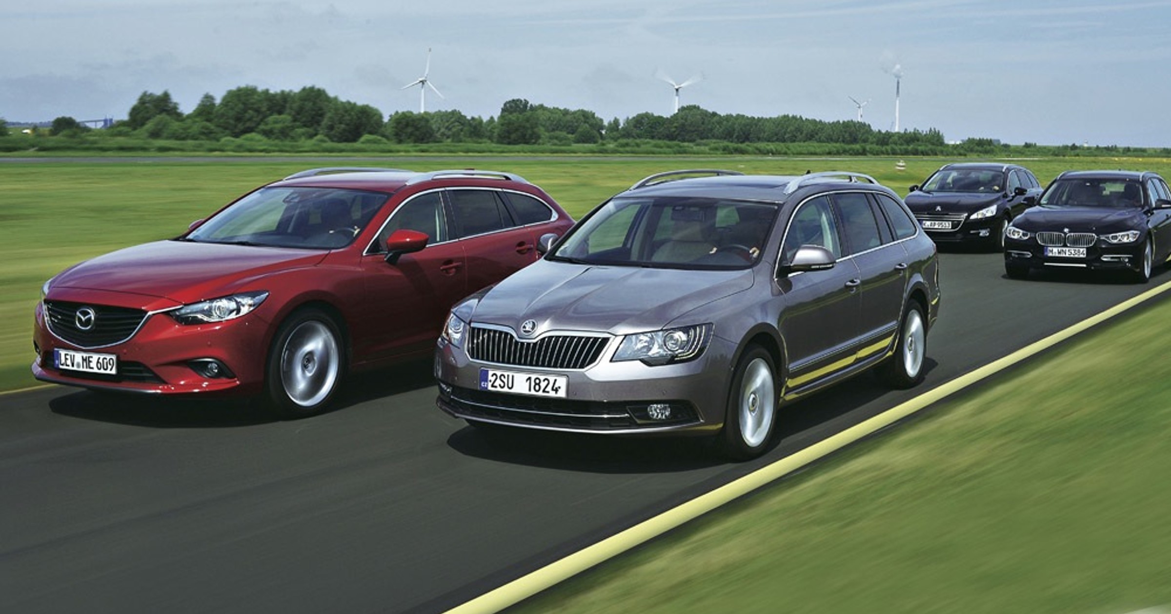 Kombi klasy średniej: Skoda Superb Combi po liftingu, BMW serii 3 Touring, Mazda