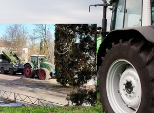 Ukraińcy starają się pomagać armii. Traktor wywozi rosyjski transporter opancerzony