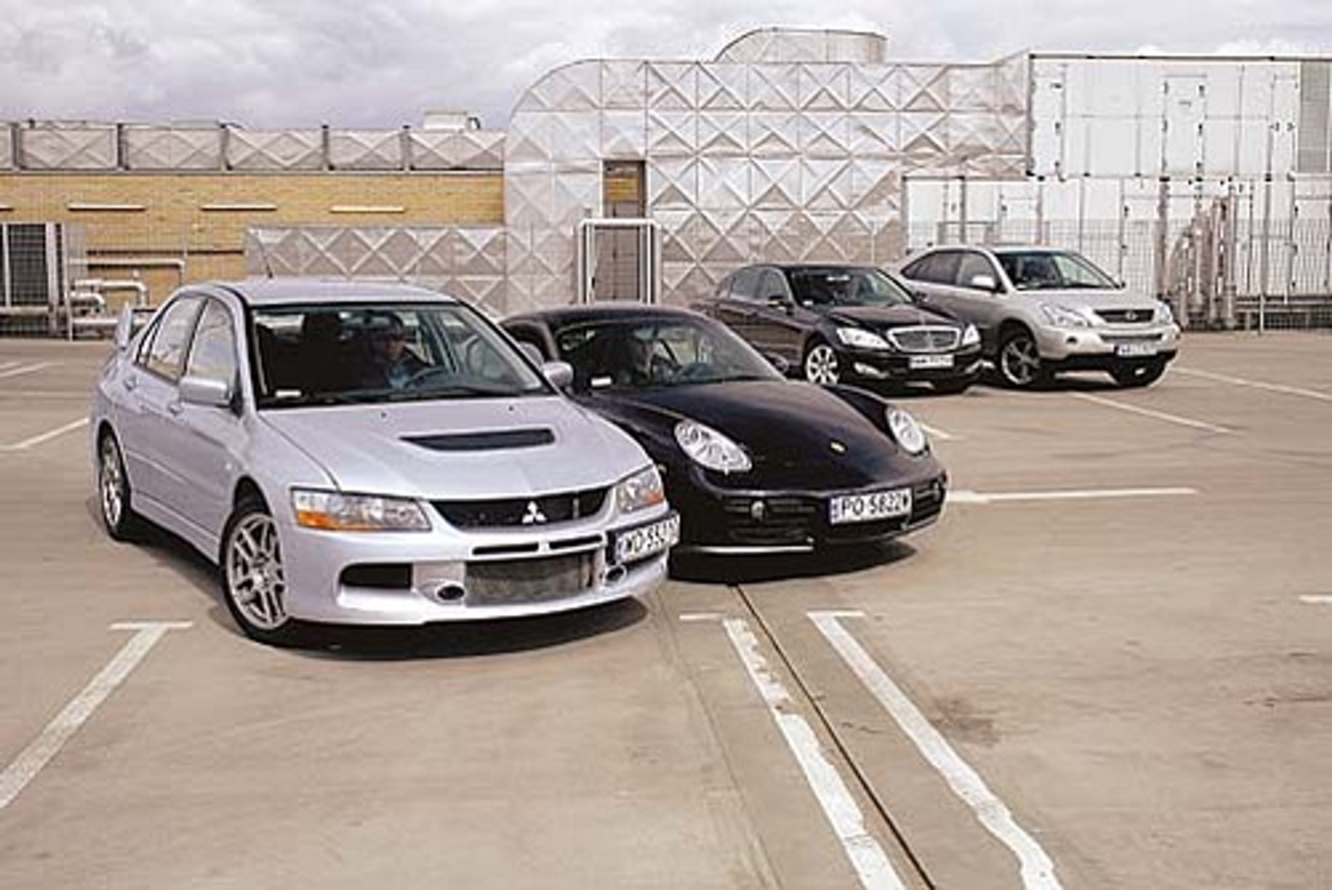 Mitsubishi Lancer Evo IX, Porsche Cayman, Mercedes klasy S, Lexus RX 400h - Jak ujarzmić 300 KM?