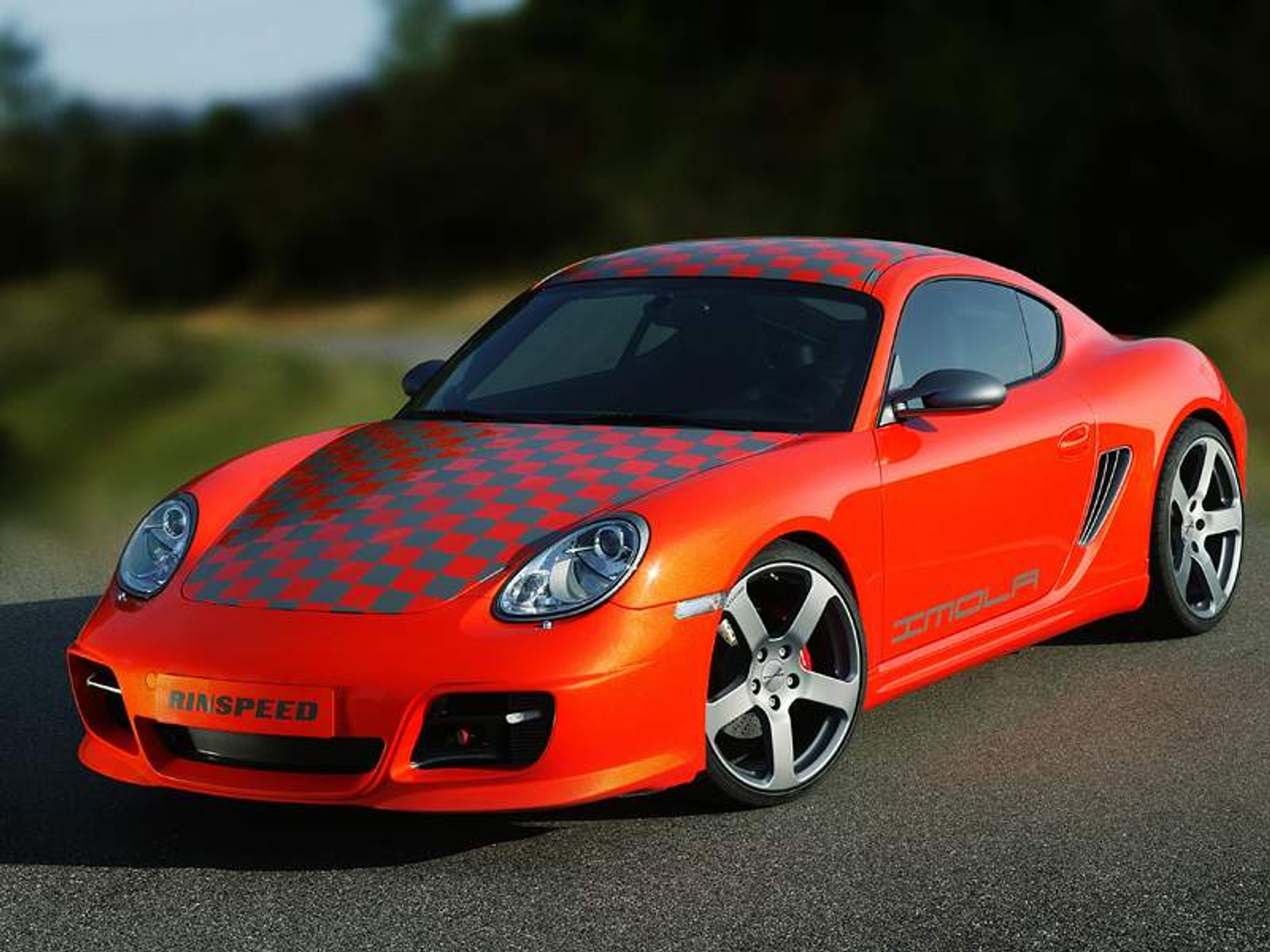 Rinspeed w Paryżu: podrasowany Cayman i Carrera 4