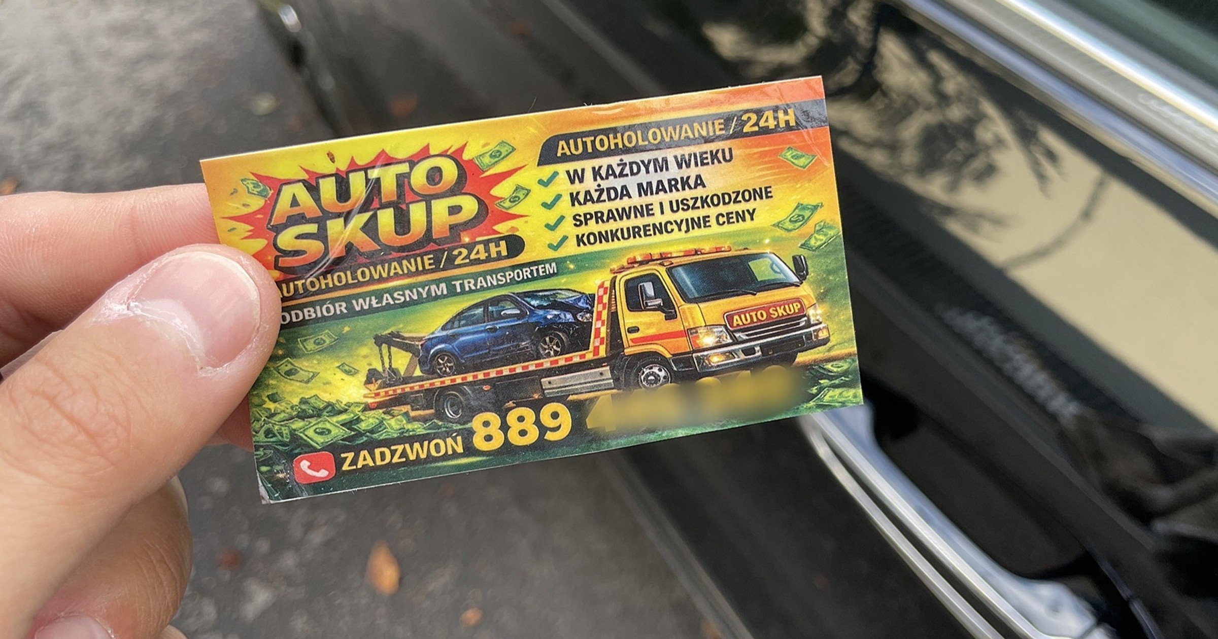 Ulotka auto skupu znaleziona za wycieraczką samochodu