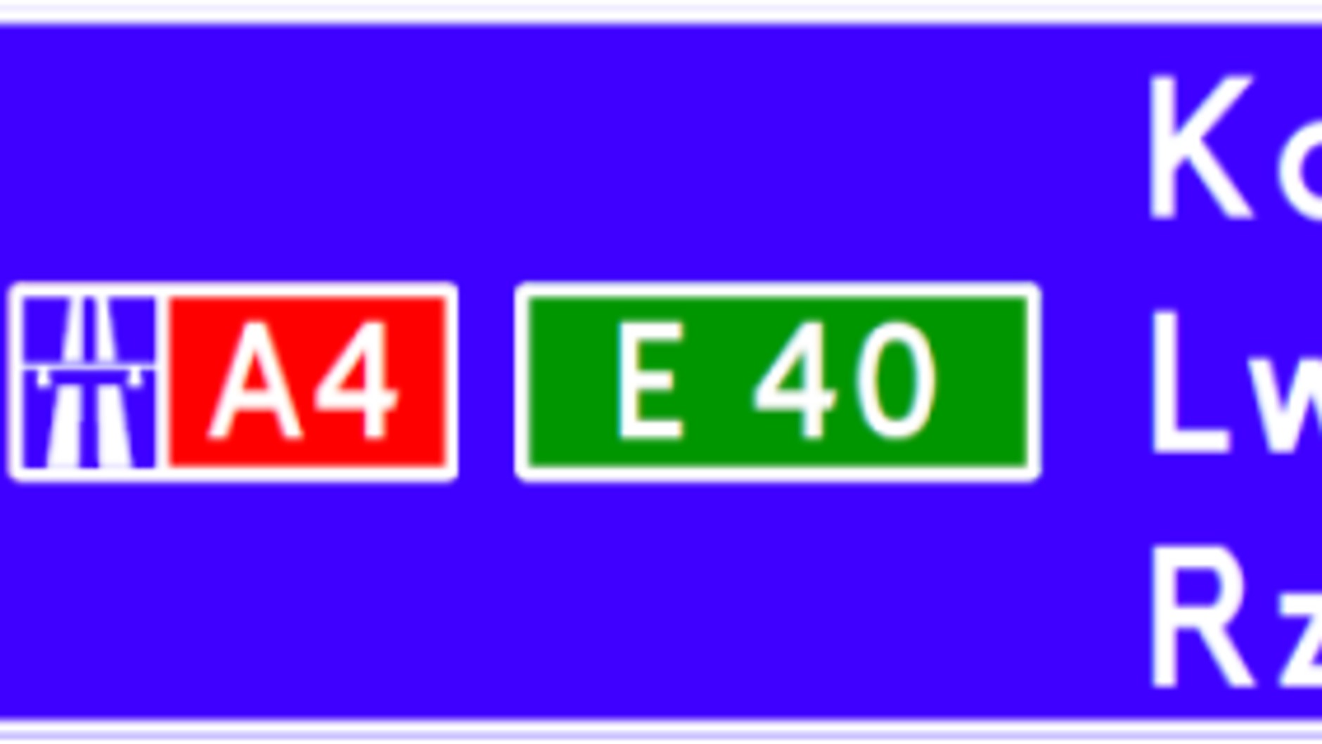 E-2b na drodze krajowej innej niż autostrada i droga ekspresowa, wskazujący dojazd do autostrady