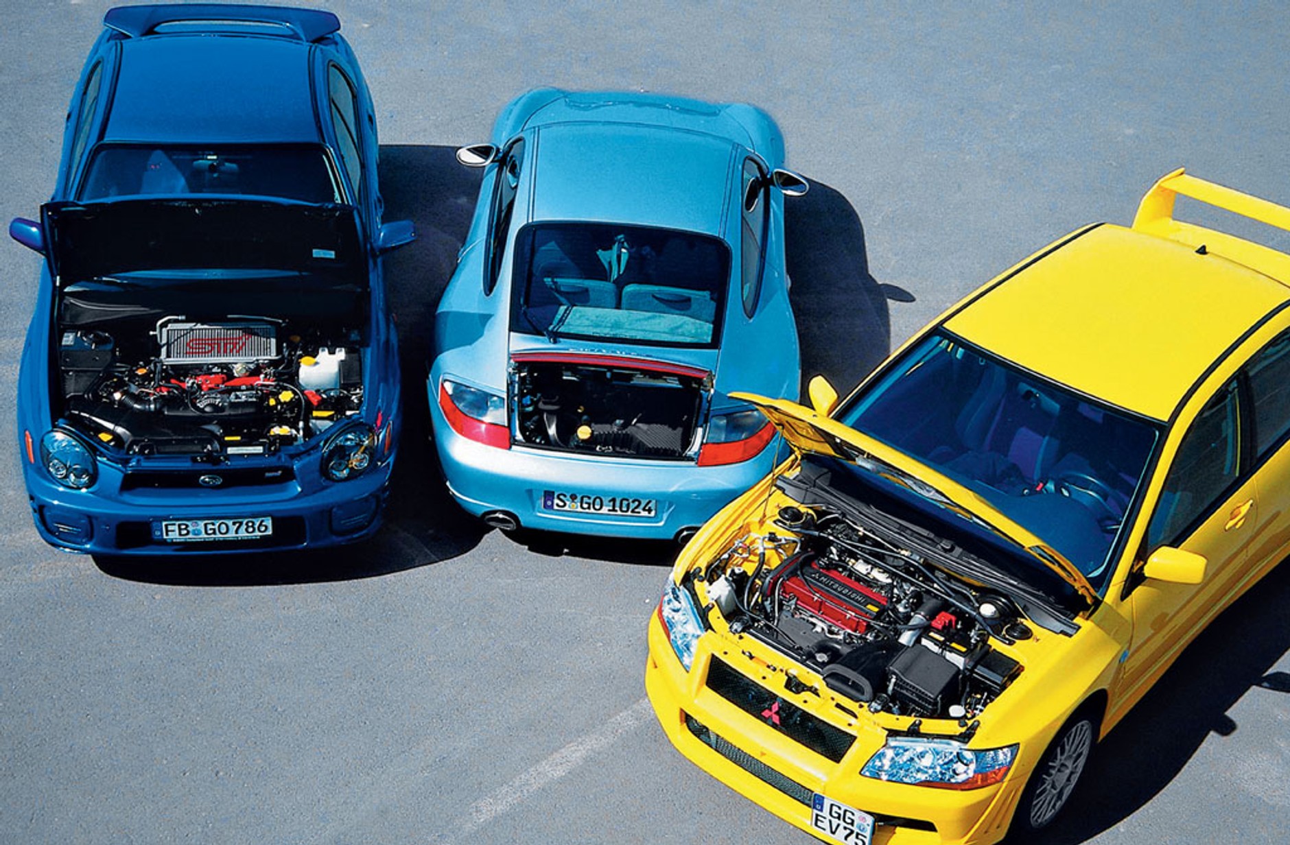 Używki w pełni legalne: Mitsubishi Lancer EVO VII kontra Porsche 911 Carrera i Subaru Impreza WRX STI