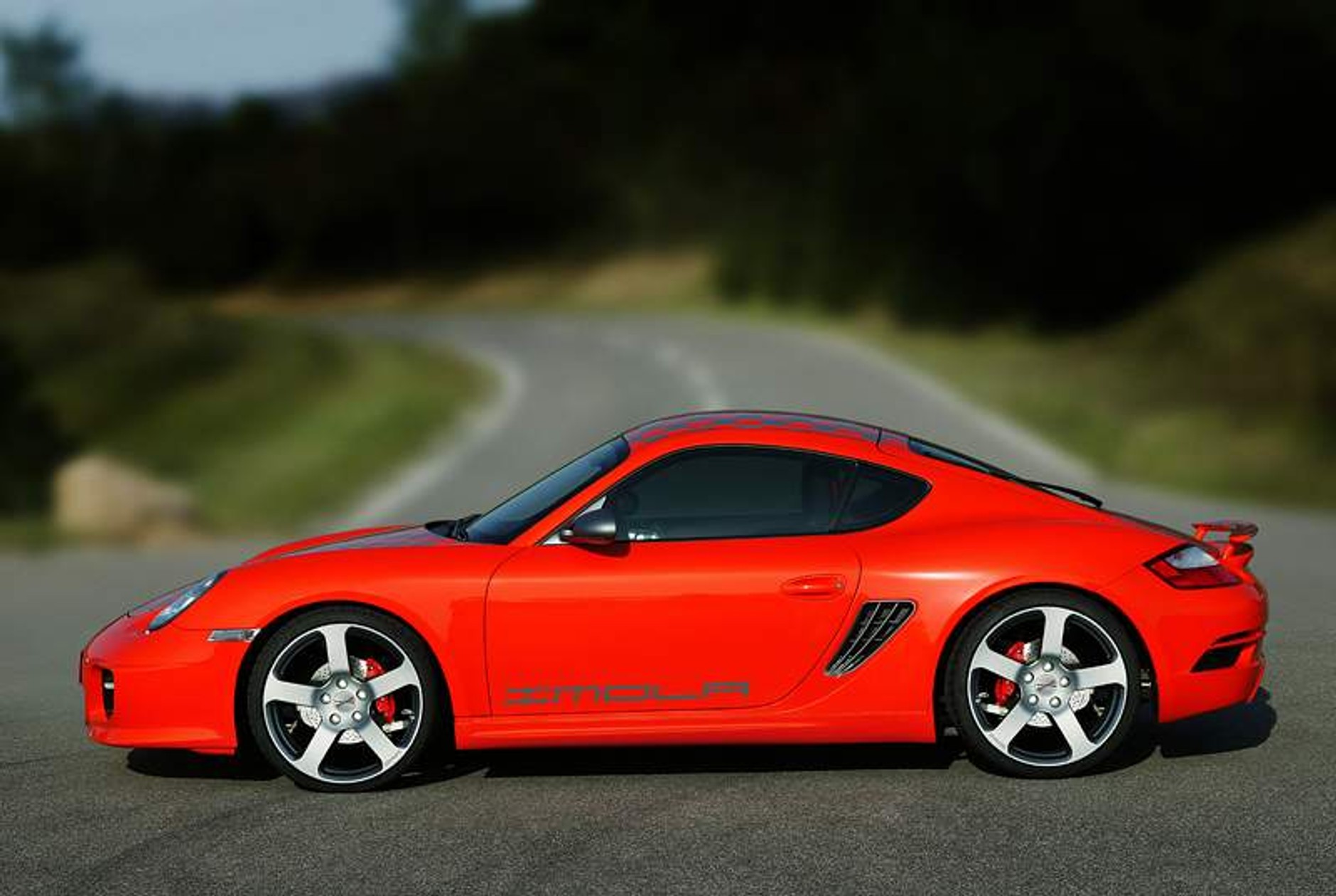 Rinspeed w Paryżu: podrasowany Cayman i Carrera 4