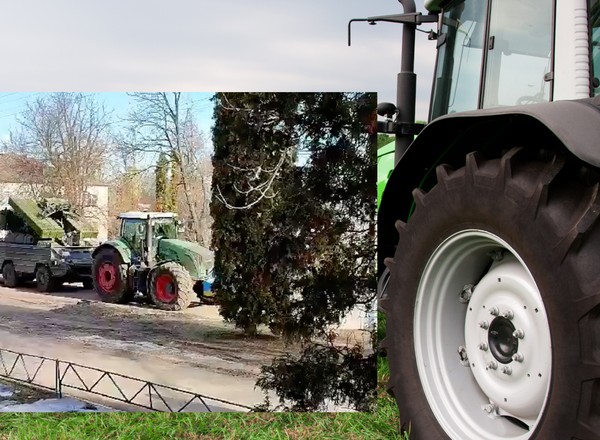 Ukraińcy starają się pomagać armii. Traktor wywozi rosyjski transporter opancerzony