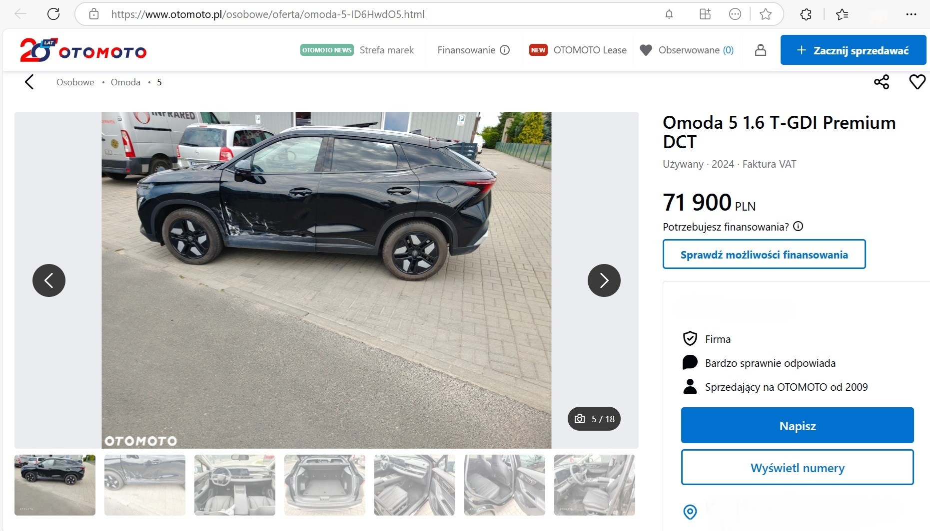 Zrzut ekranu z ogłoszenia z widocznymi uszkodzeniami SUV-a