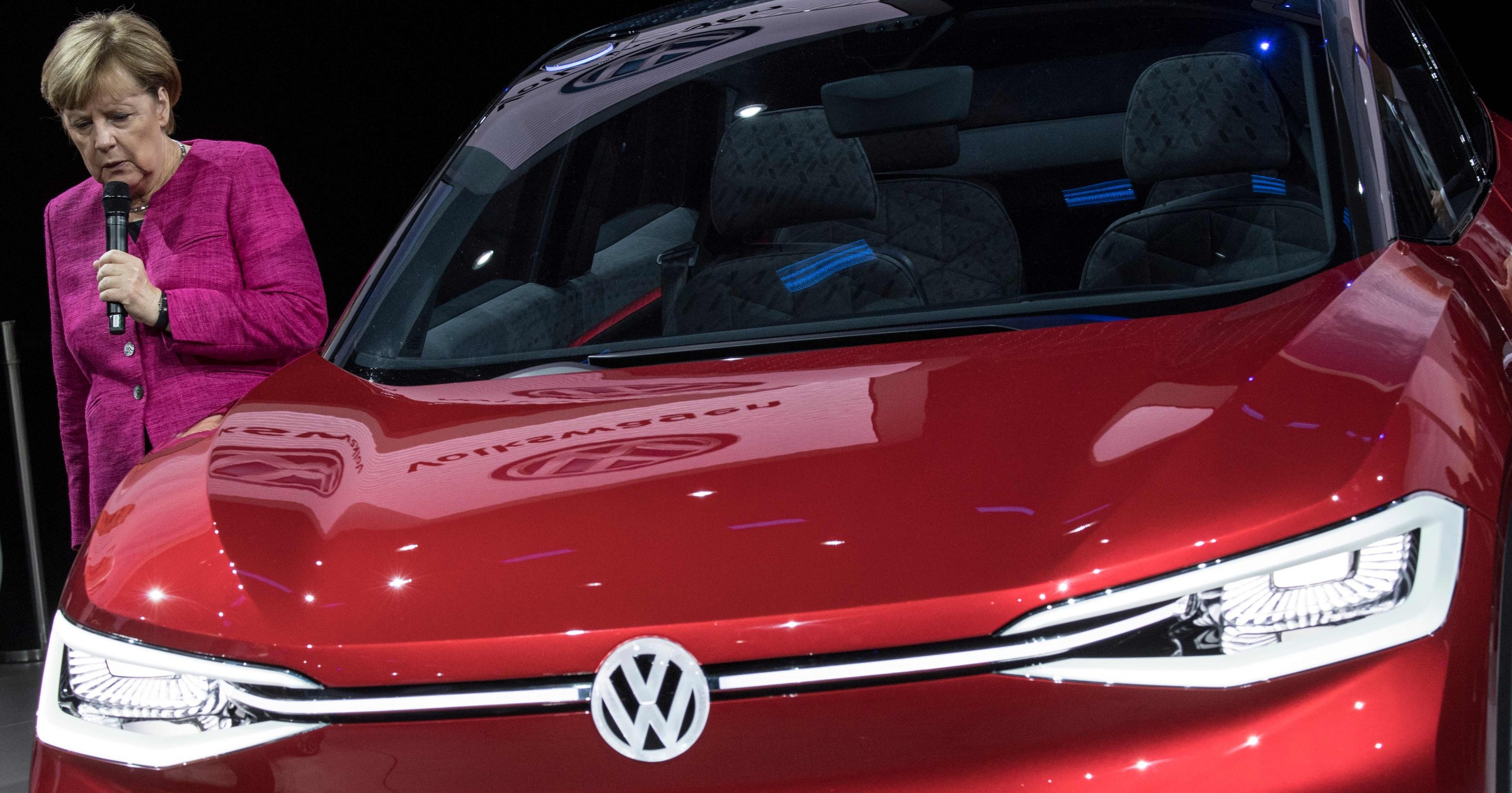 GERMANY-ECONOMY-AUTOMOBILE-IAA-MERKEL