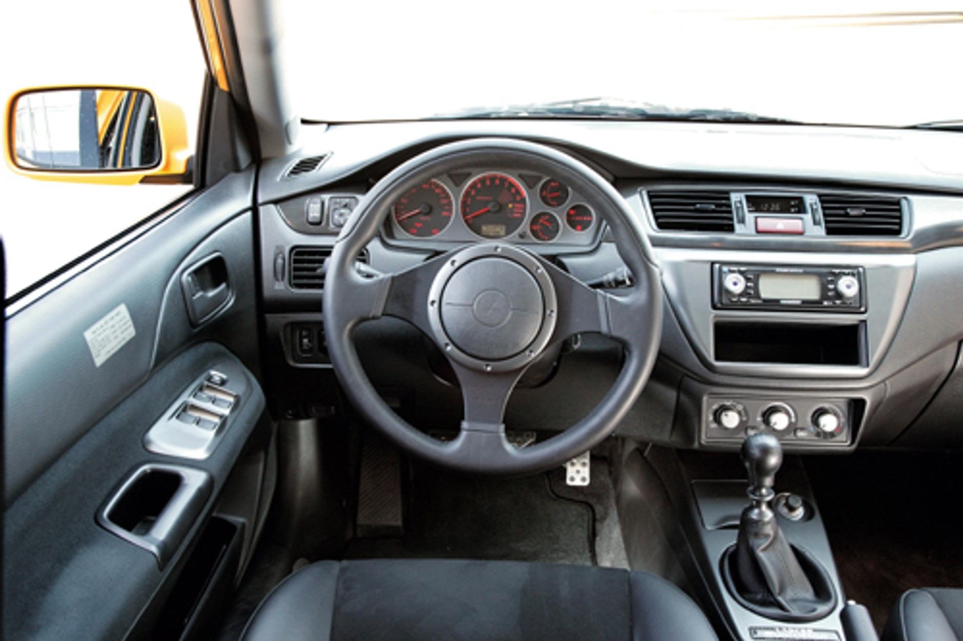 Lancer Evo IX kontra 911 GT3 - Ta sama frajda za 1/ 3 ceny?