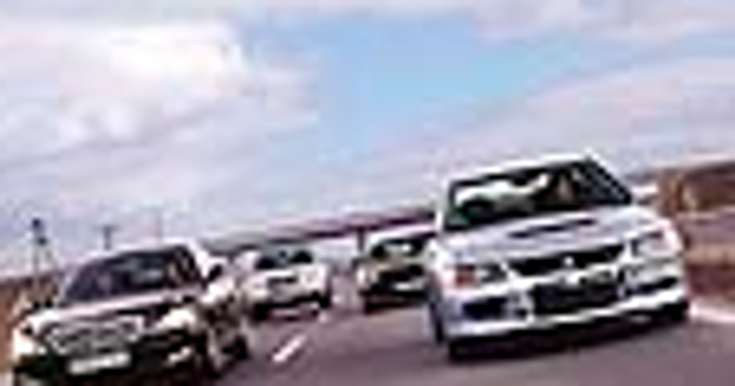 Mitsubishi Lancer Evo IX, Porsche Cayman, Mercedes klasy S, Lexus RX 400h - Jak ujarzmić 300 KM?