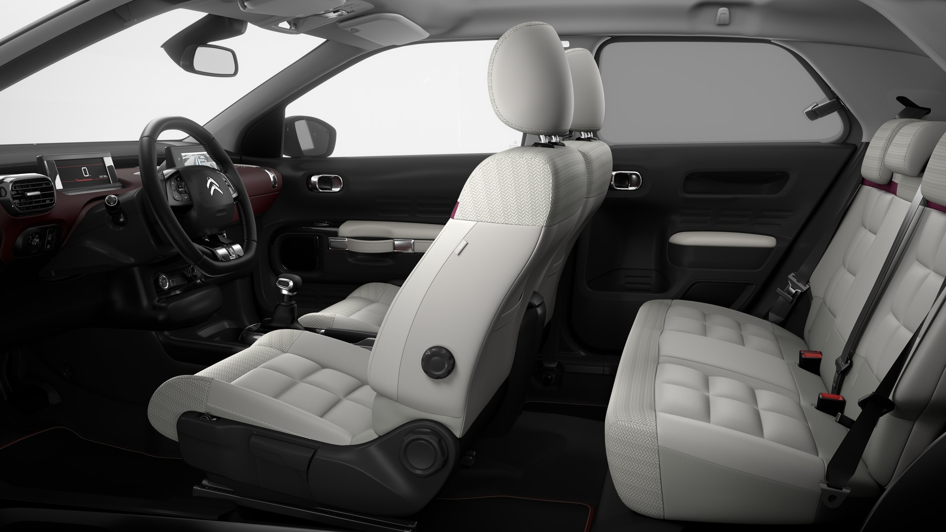 W środku sporo miejsca. By uzyskać więcej przestrzeni na kolana dla pasażerów powiększono wgłębienia w fotelach. Citroen C4 Cactus