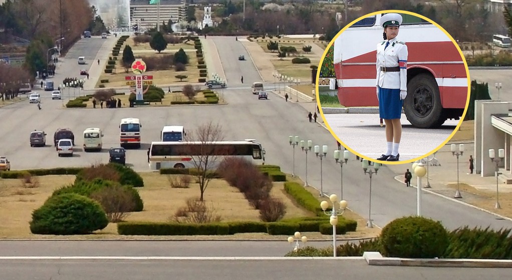 Na zdjęciu jedna z głównych ulic Pjongjangu. W kółku policjant służby drogowej z Korei Północnej (Wikipedia/Cheddaz)