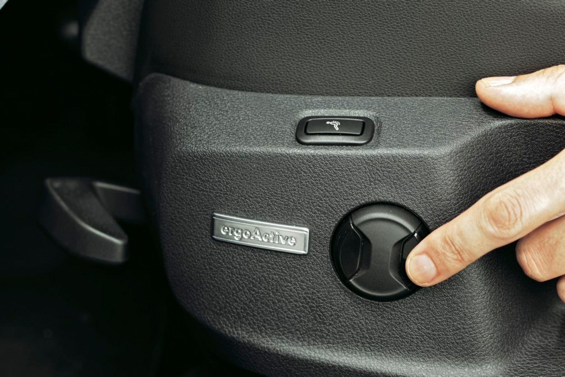 Folkswagen Golf przyciski na fotelu