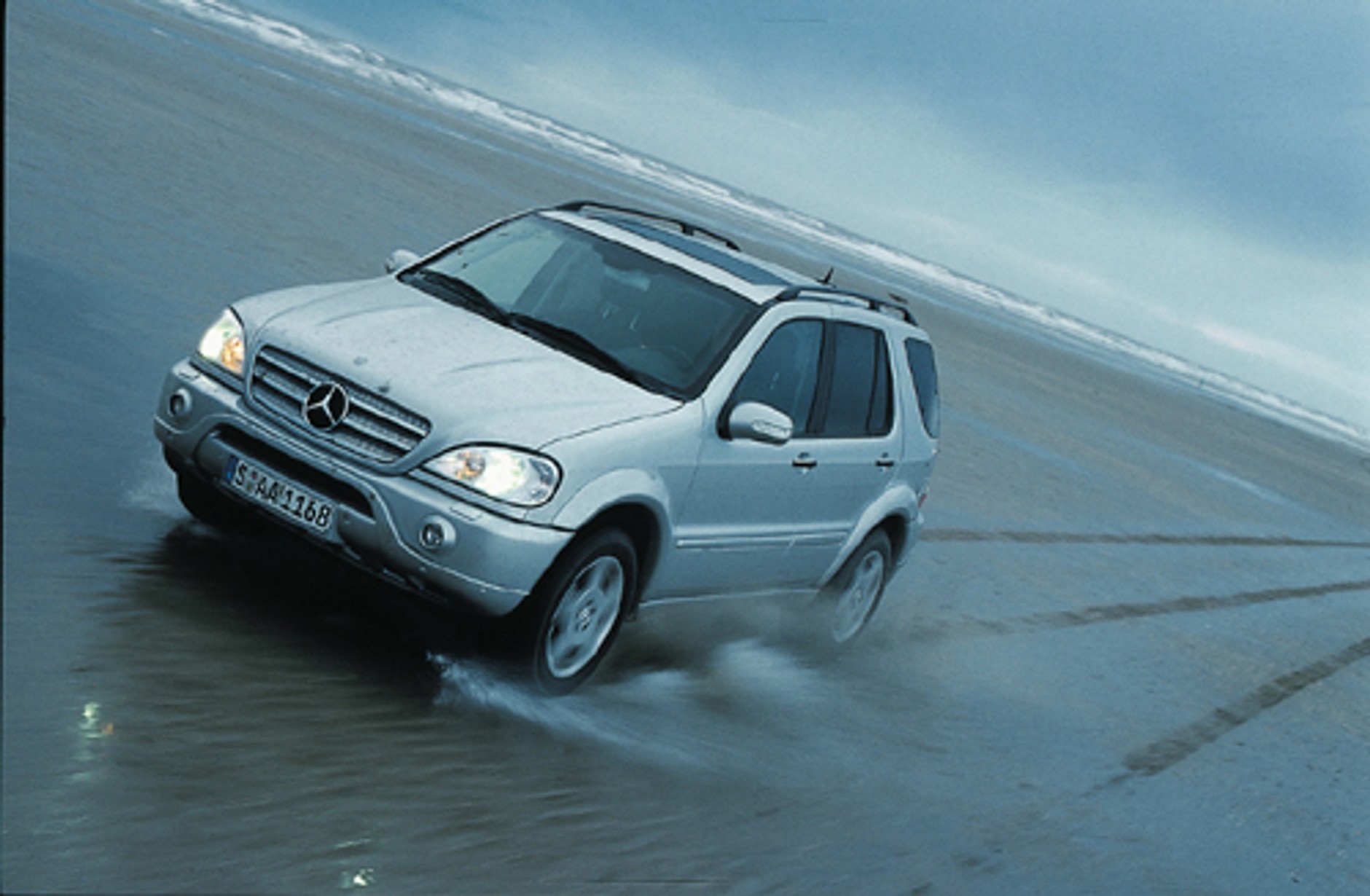 Porsche Ceyennne S kontra Mercedes ML 55 AMG i BMW X5 4.6is - strarcie terenówek dla bogatych