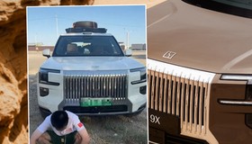 Załamany właściciel na tle swojego unieruchomionego chińskiego SUV-a