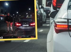 Wyskoczył z BMW z pizzą w ręku. Zachowanie nagrywającego go rozsierdziło