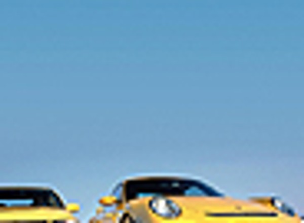 Lancer Evo IX kontra 911 GT3 - Ta sama frajda za 1/ 3 ceny?